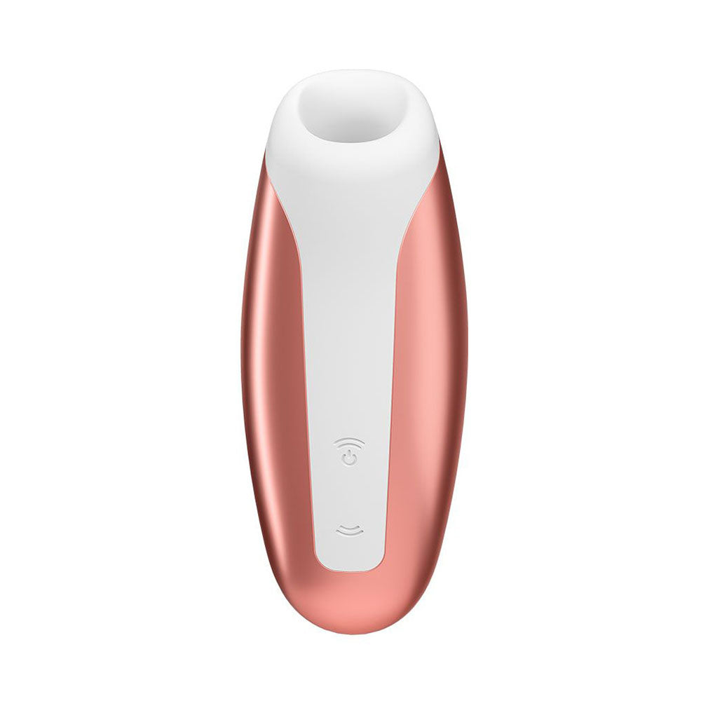 Copper-coloured clitoral massager from Satisfyer Pro, featuring a sleek, curved design for intimate stimulation.