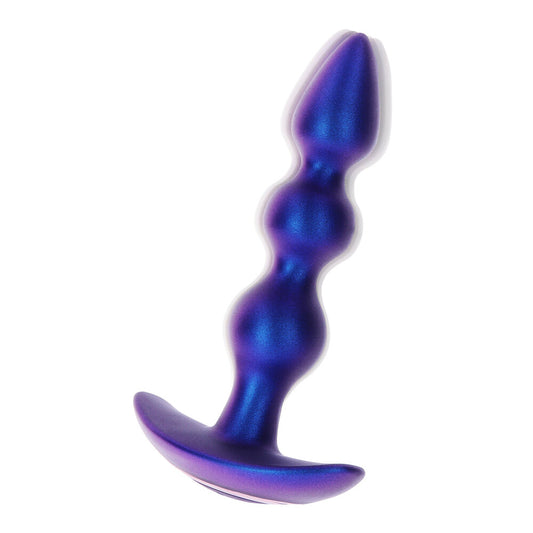 Vibrating, shimmering silver butt plug from toy joy sex toys, for adventurous fun.