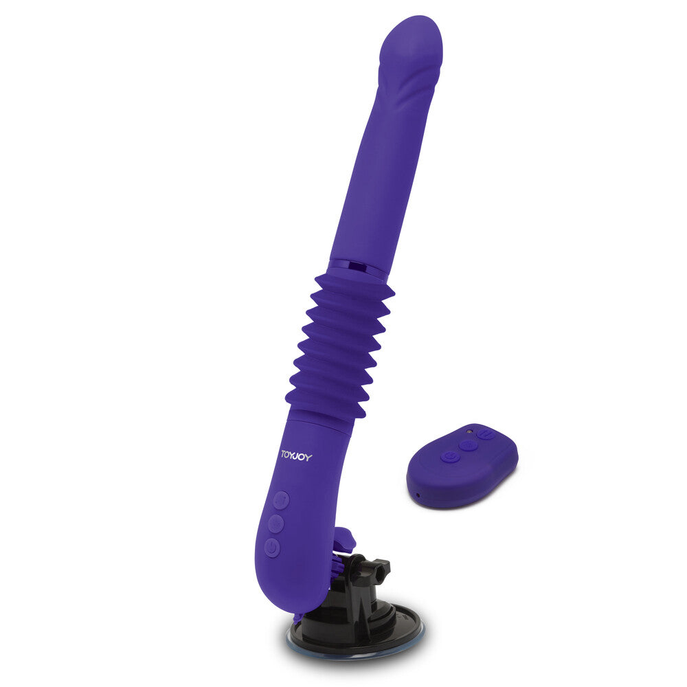 Close-up of the 'magnum opus supreme thruster 2' vibrator, purple silicone with ridges.