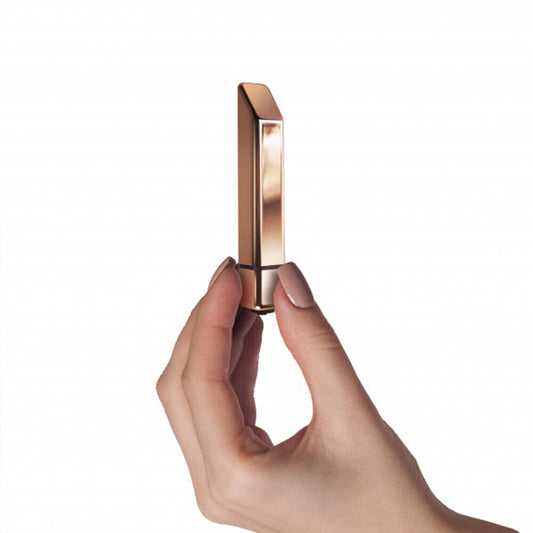 Rose gold vibe with bamboo detailing, a mini vibrator from Rocks Off for pleasure.