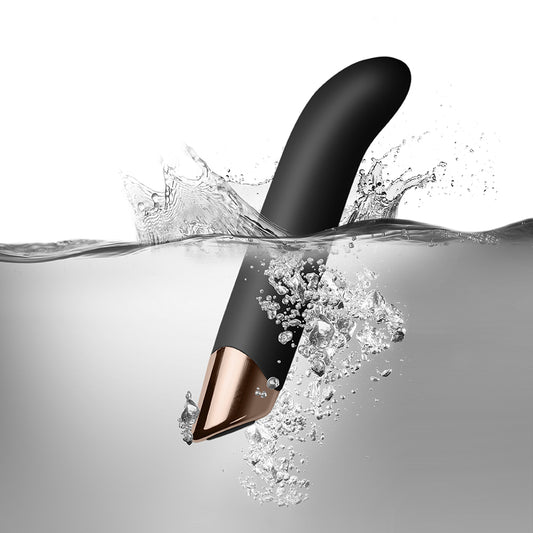 Close-up of a black, textured g-spot vibrator with a smooth, curved design for pleasure.