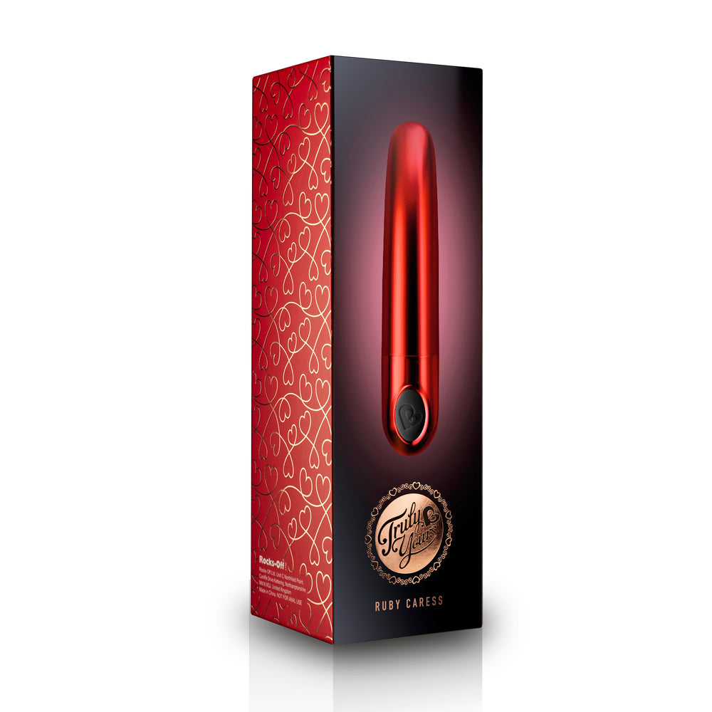 Ruby red vibrator with smooth finish, designed for sensual pleasure and intimate exploration.