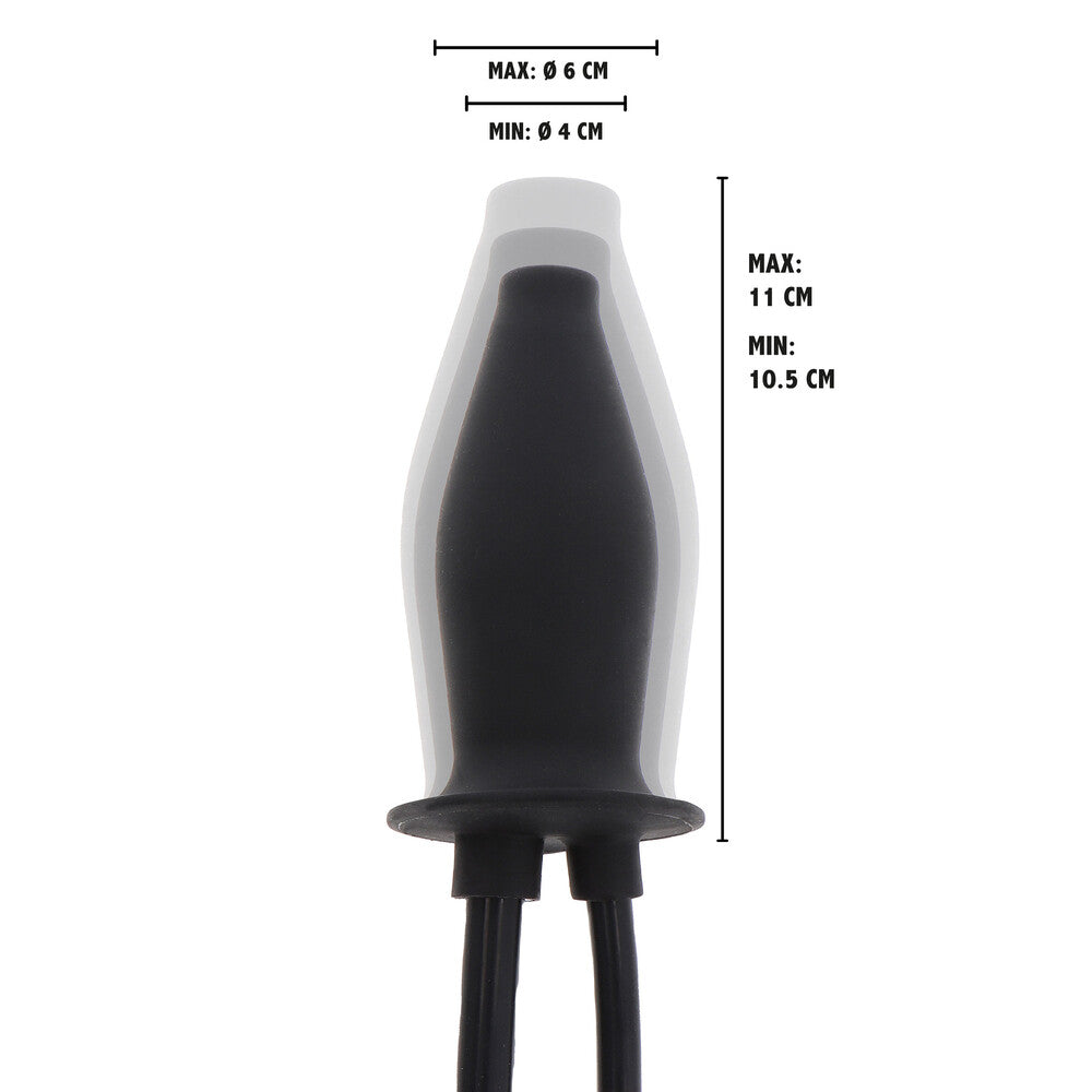 Close-up of a ribbed, flesh-toned anal plug with an inflation bulb and tube.
