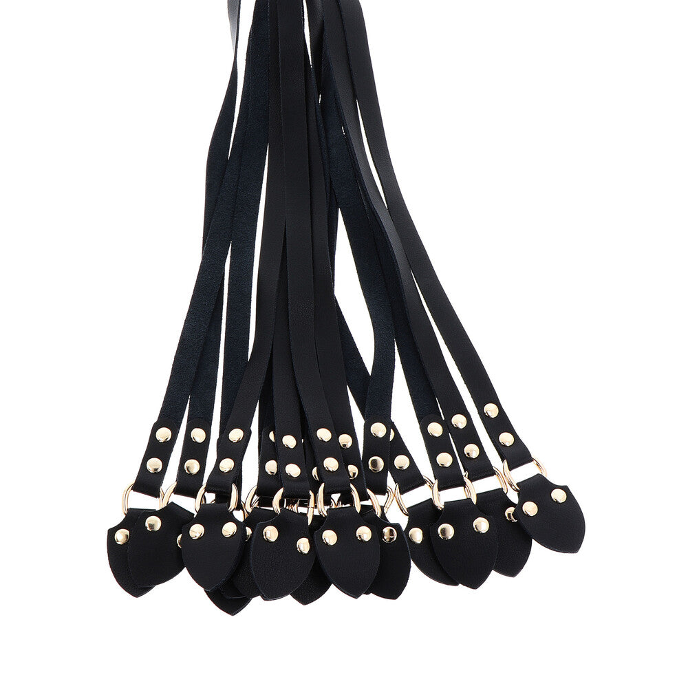 A black leather cato-nine whip, part of the masters collection from hidden desire.
