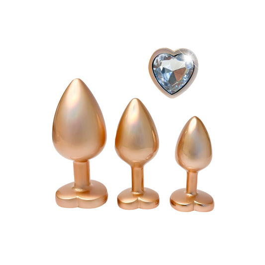 dream toys gleaming gold butt plug set with pearl jewels, for intimate pleasure.