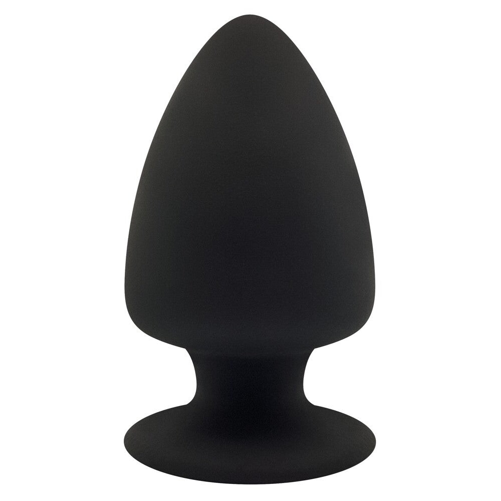 Smooth, medium-sized silicone butt plug in a subtle shade, designed for comfortable wear.