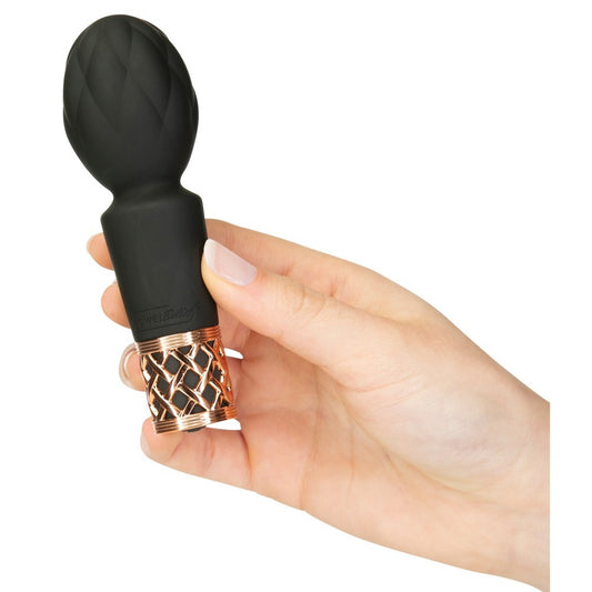 The Pillow Talk Secrets pleasure mini massager, a small, sleek vibrator in a discreet design.