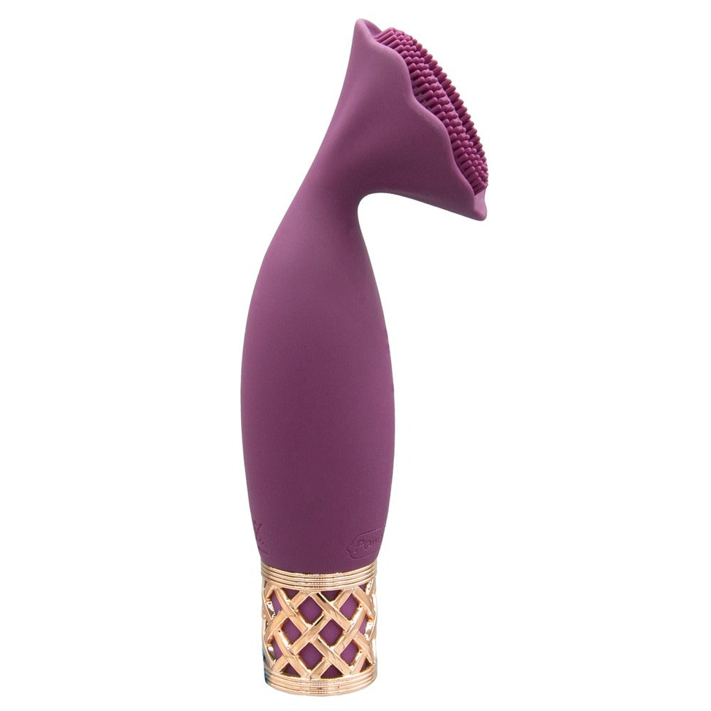 Close-up of a small, pink, bullet-shaped vibrator massager with a smooth, matte finish.