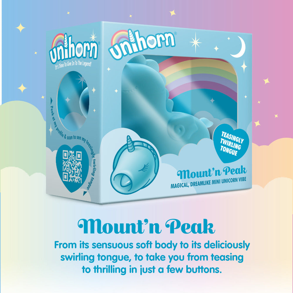 Close-up of a pastel rainbow unicorn clitoral vibrator with a twirling tongue, ready for pleasure.