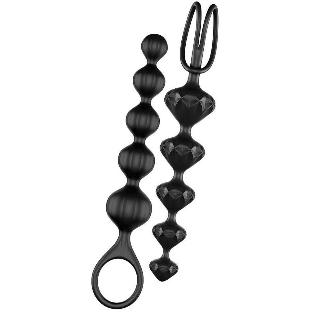A set of two sleek, progressively sized anal beads in a smooth, purple silicone.