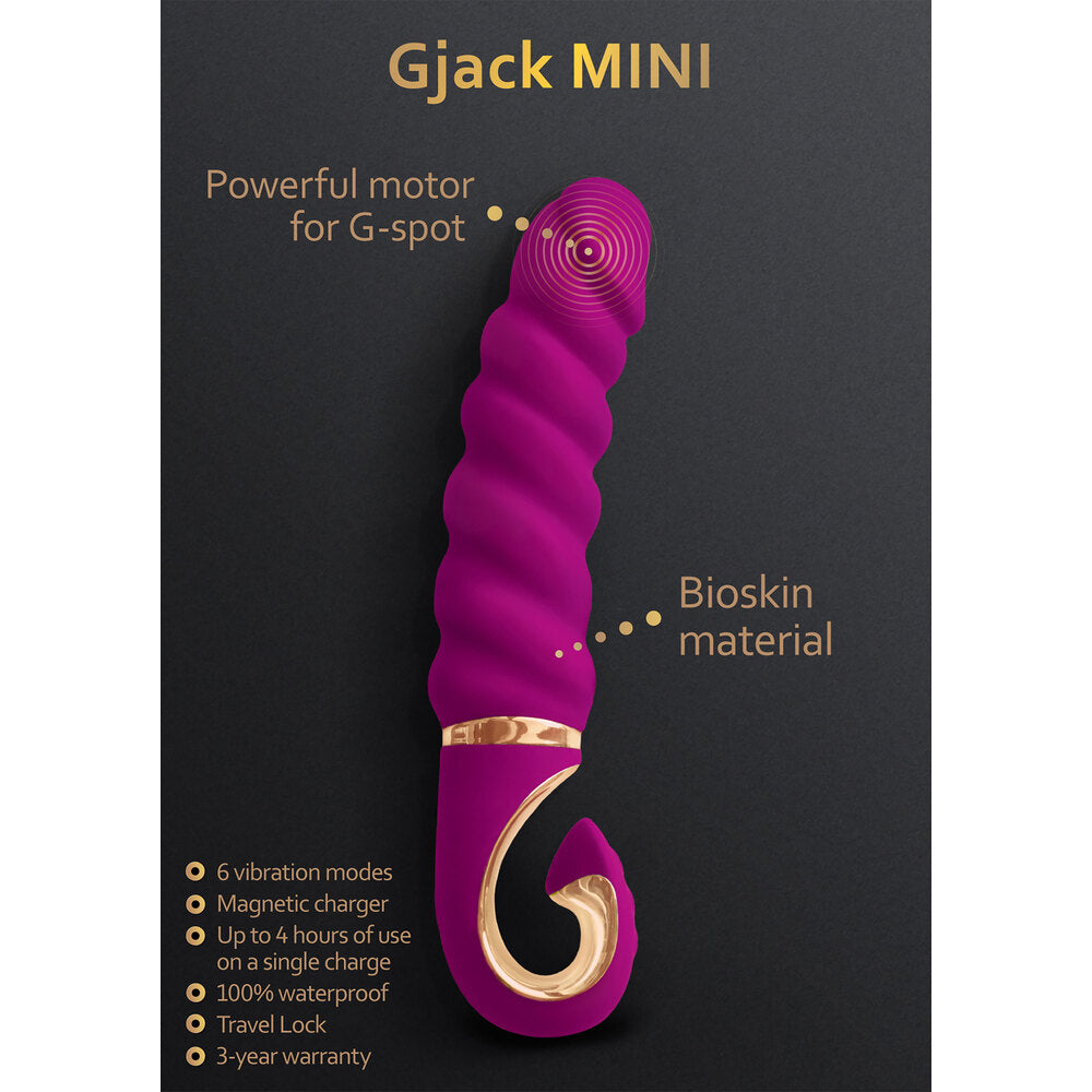 Close-up of a petite, sleek g vibe gjack mini vibrator, likely silicone and in an unspecified colour.