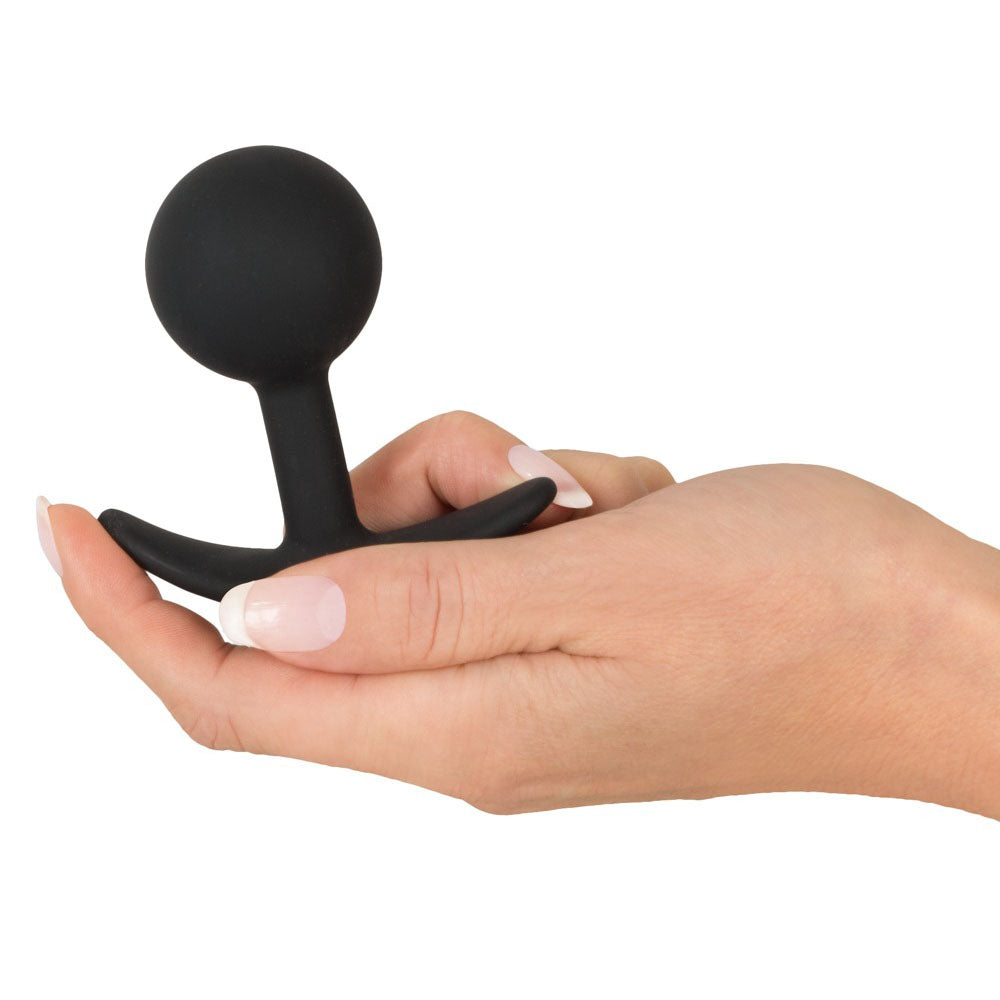 You2Toys backdoor friend medium butt plug, smooth black silicone with a rounded t-base.