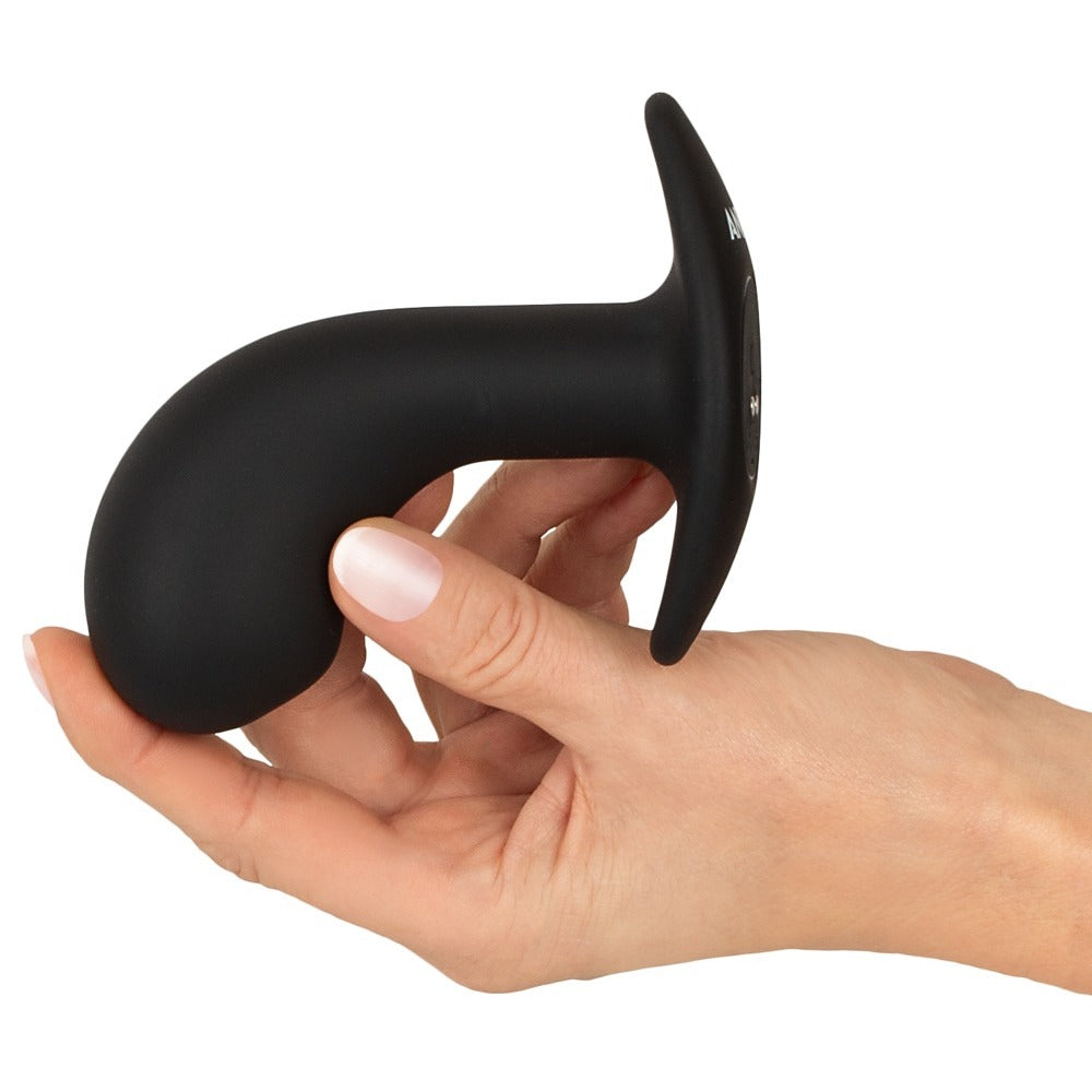 A large, smooth, red prostate plug from various toy brands, designed for prostate massage.