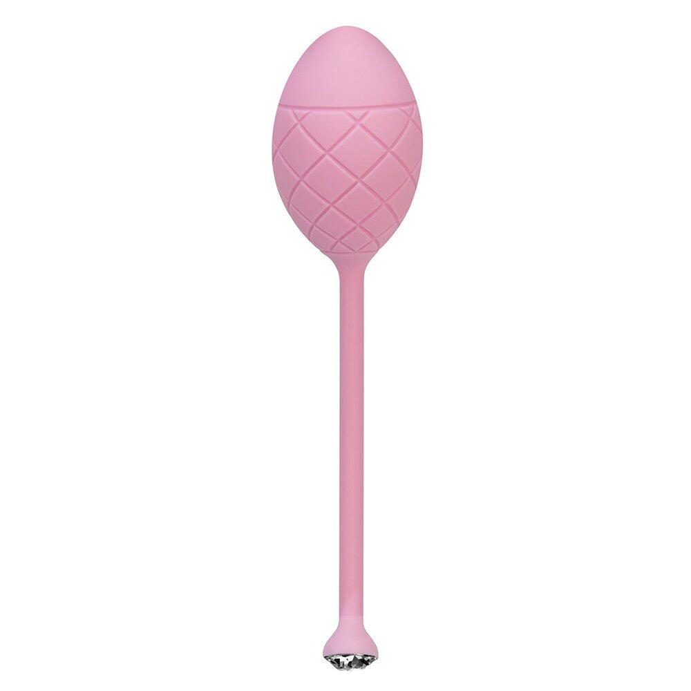 Pink, weighted pleasure balls for pelvic floor exercises, displayed on a neutral surface.