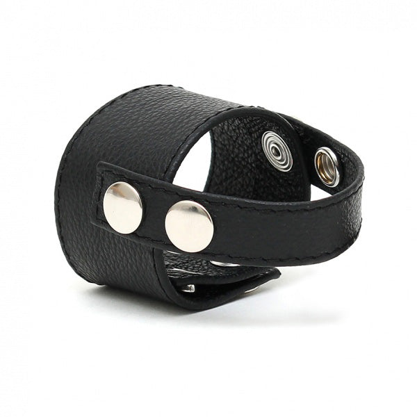 Black leather cock ring strap for enhanced bondage play, featuring a secure buckle fastening.