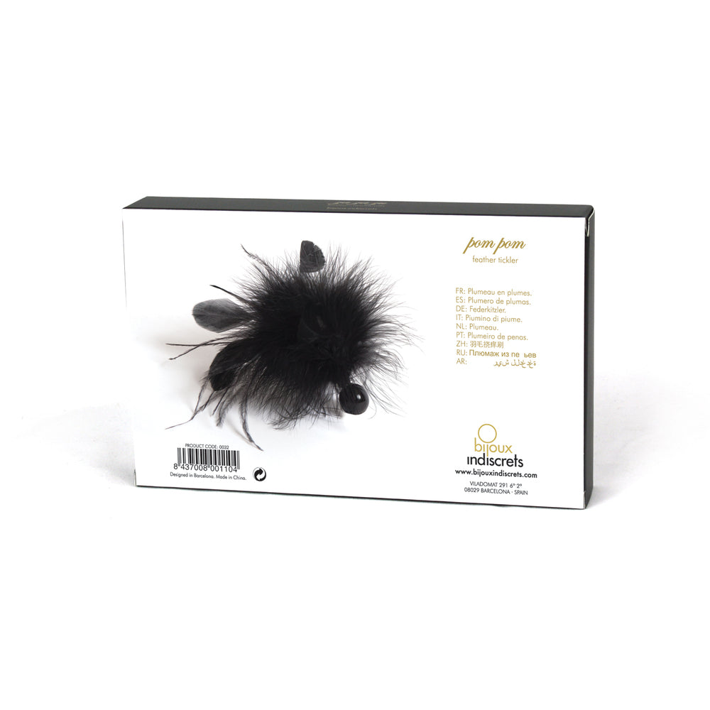 Bijoux Indiscrets feather tickler with a fluffy pink pom pom, a playful accessory.