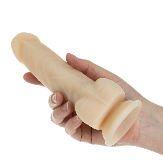 Realistic, rotating and vibrating dildo, seven inches, for adult use and pleasure.