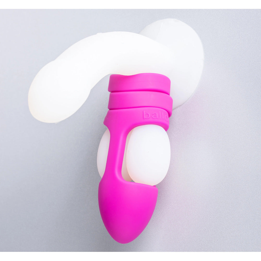 Purple ball dildo from various toy brands, a textured penis sleeve for enhanced pleasure.