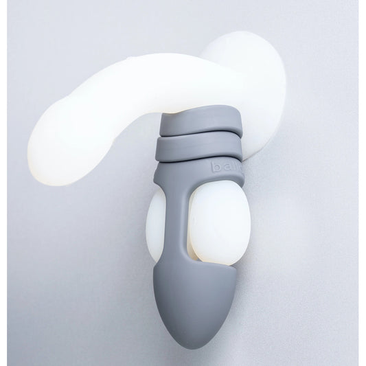 Steel grey balldo, a reusable penis sleeve made from body-safe material.