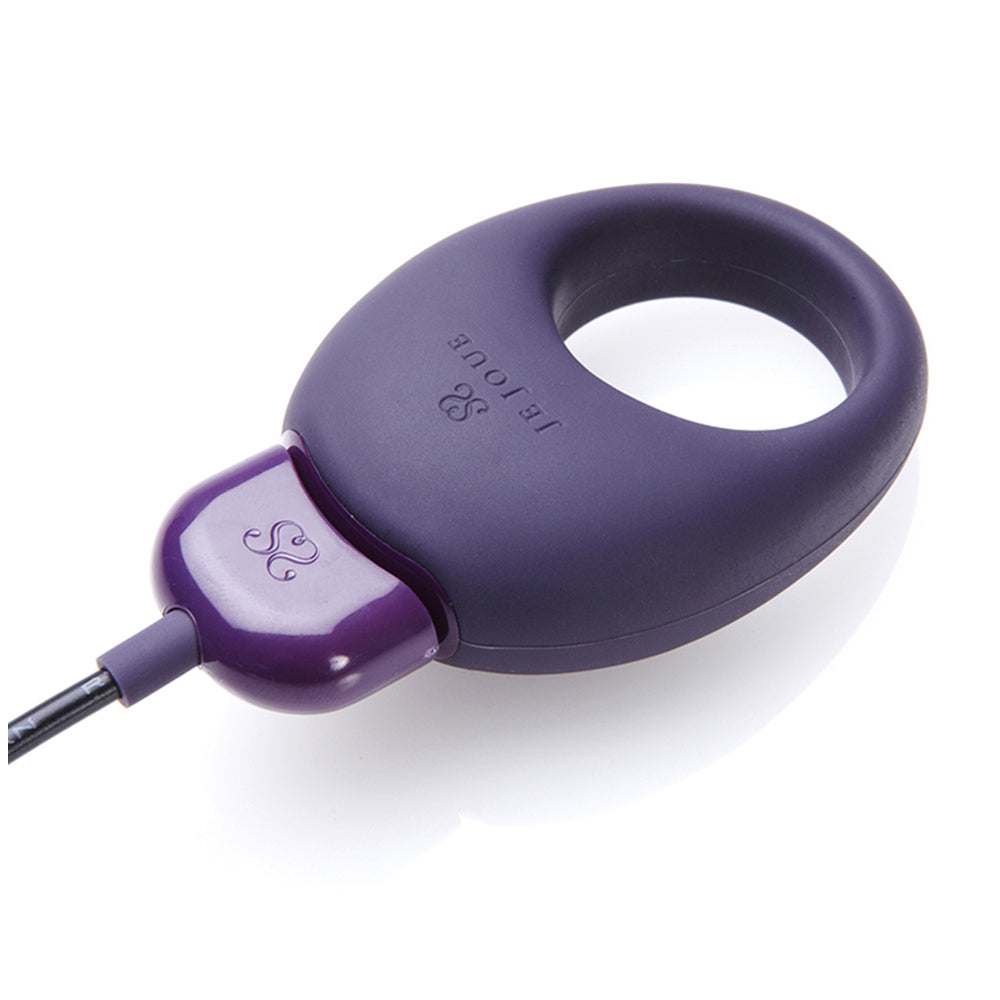 Purple rechargeable cock ring vibrator designed for enhanced pleasure and intimate moments.