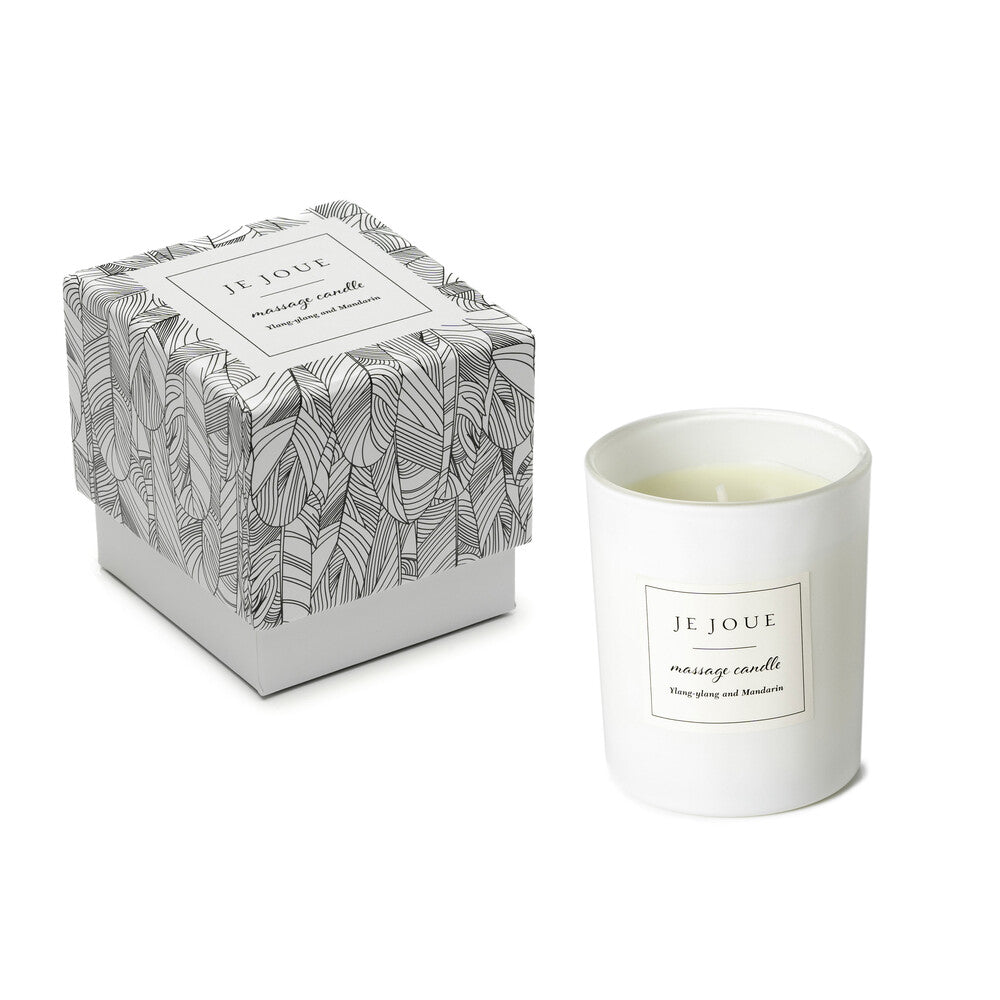 Je Joue ylang ylang and mandarin massage candle in a neutral ceramic container.