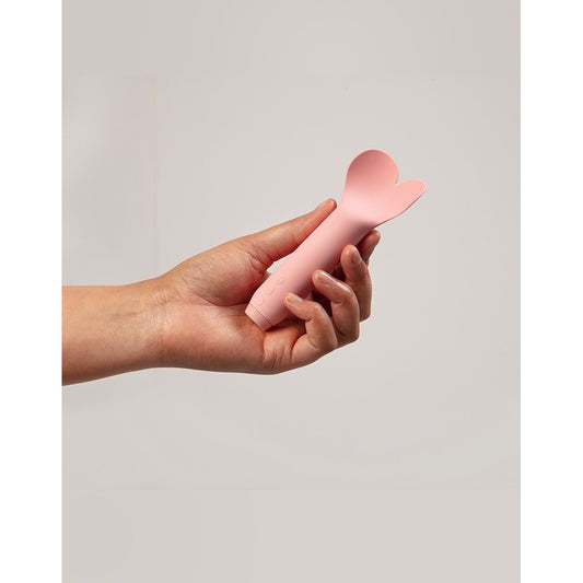 A petite, bullet-shaped vibrator with a smooth, matte finish, perfect for discreet pleasure.