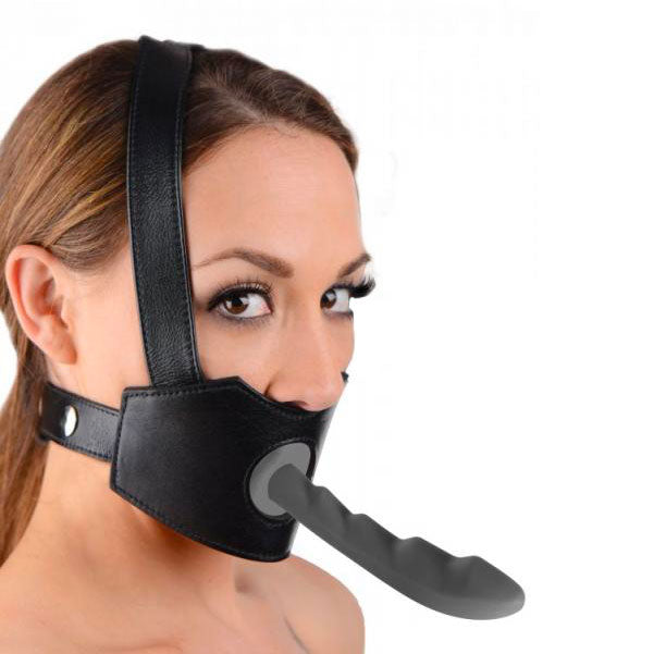 Black master series dildo face harness with adjustable straps and metal buckles for strap-on fun.