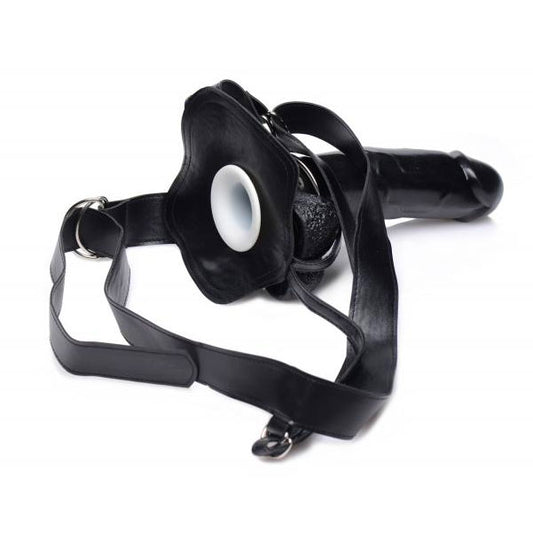 Black, nine-inch master series infiltrator 2 dildo with a hollow strap-on design.