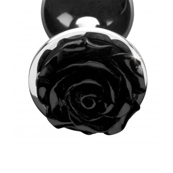 Small black anal plug with a rose design, designed for intimate pleasure.