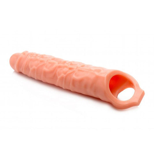 A flesh-toned, three-inch penis extender sleeve from size matters, designed for improved performance.