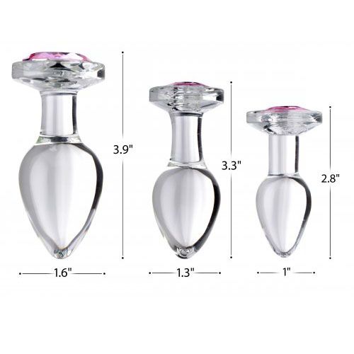 Three pink glass anal plugs with gem embellishments, ideal for pleasure and exploration.