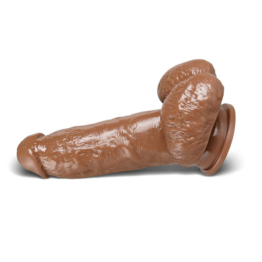 Realistic flesh-toned dildo with a flexible shaft, showcasing its lifelike texture and shape