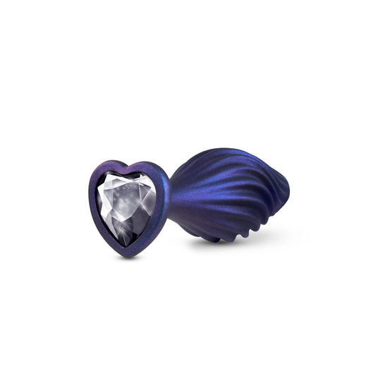 A swirling, jewelled butt plug from blush novelties with a matrix-like design for anal pleasure.