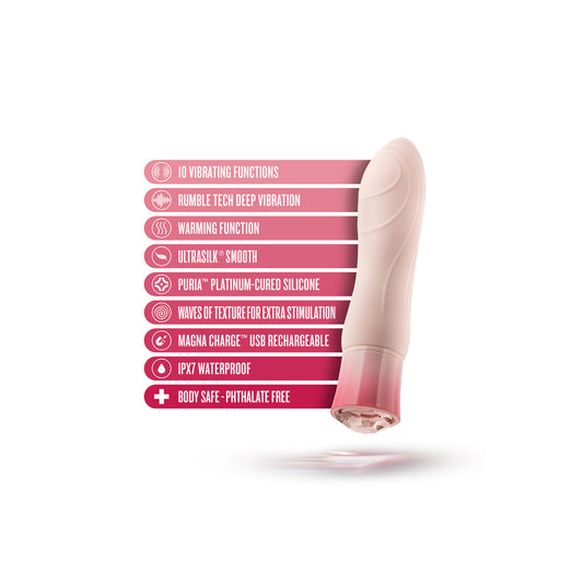 Close-up of a blush-pink morganite-coloured mini vibrator, showcasing its elegant and smooth finish for personal pleasure.