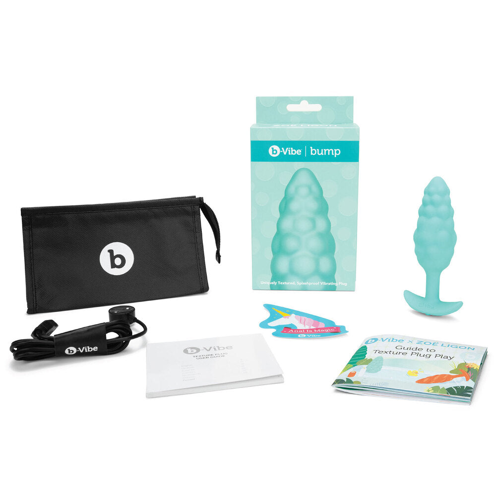 Textured mint green vibrating butt plug from B-Vibe, a sensual pleasure toy.