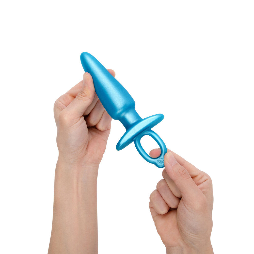 Sleek silver prostate plug from B-Vibe, showcasing its smooth, ergonomic design for comfortable use.