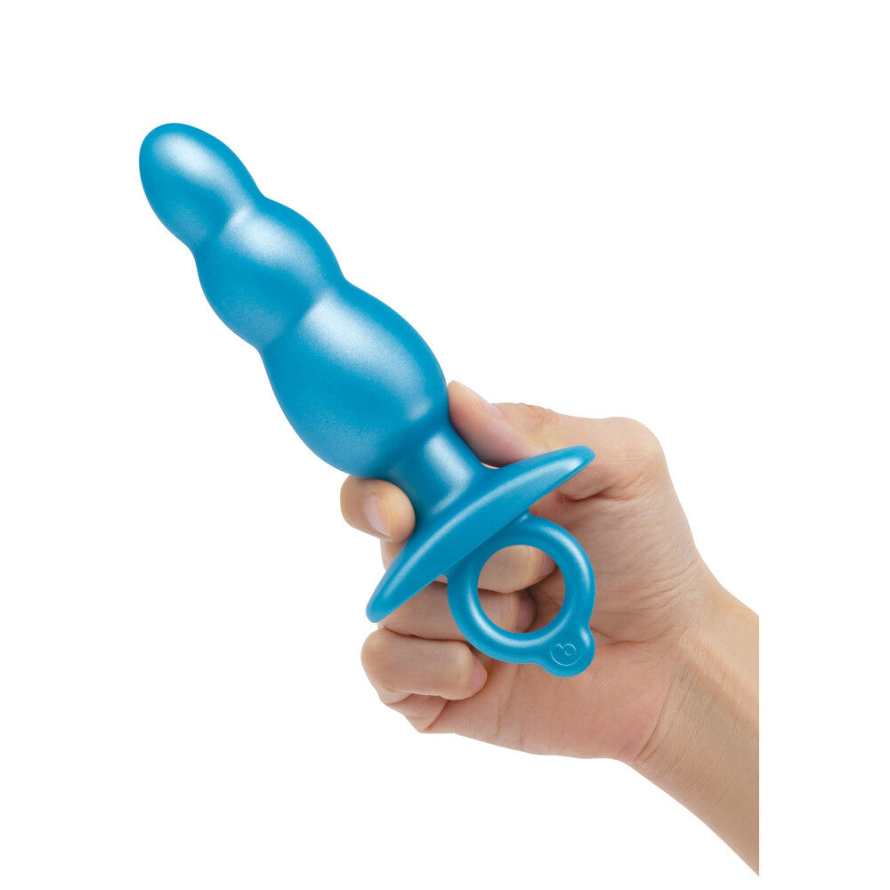 B-Vibe bounce plug, a shiny silver prostate massager for internal pleasure and exploration.
