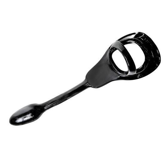 Close-up of a small, black, armour-style butt plug with a tug lock base.