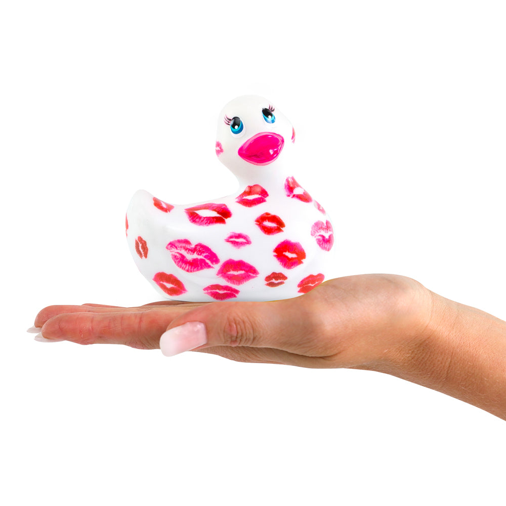 A white and pink 'I Rub My Duckie Romance' vibrator, a fun adult novelty toy.