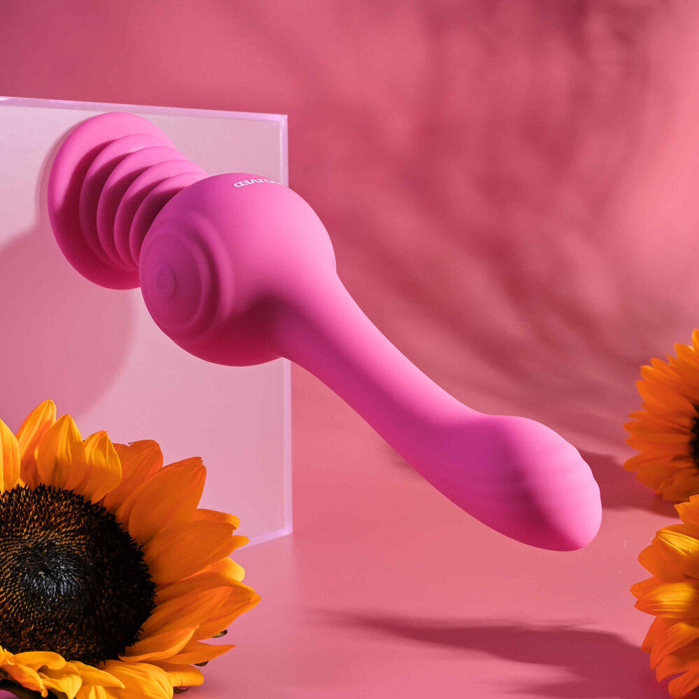 Evolved G-spot vibrator in a dusky rose shade, smooth finish and ergonomic design.