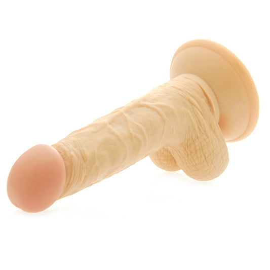 Six inch realistic dildo with detailed scrotum, lifelike texture and skin-tone finish.