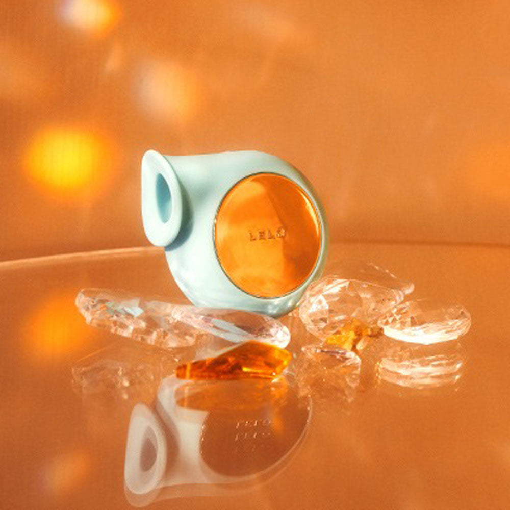 Aqua-coloured sonic wave clitoral massager by lelo, a pleasure product for enhanced stimulation.