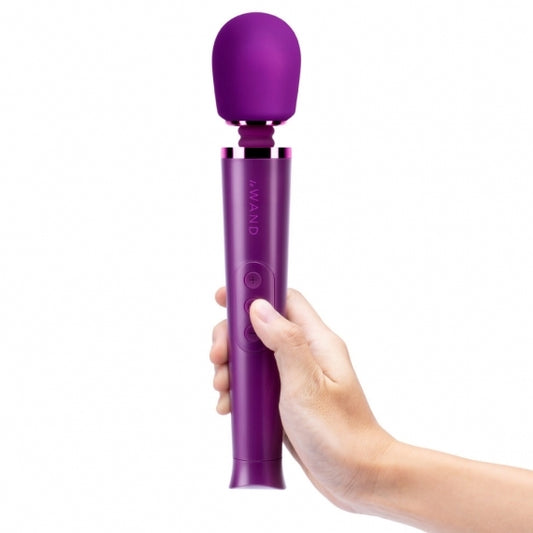 Dark cherry Le Wand Petite rechargeable vibrating massager for targeted massage and pleasure.