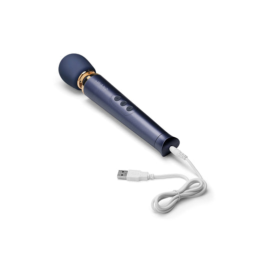 Navy blue le wand petite rechargeable vibrating wand massager, a small sensual pleasure device.