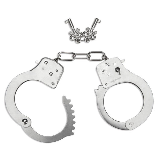 Close-up of shiny, heavy-duty metal bondage handcuffs for intimate adult play.