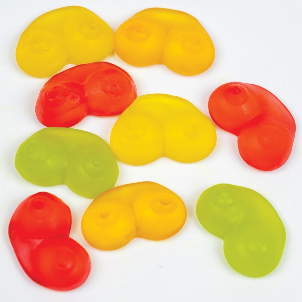 Close-up of fruit flavoured jelly sweets shaped like breasts, edible treats by spencer and fleetwood.