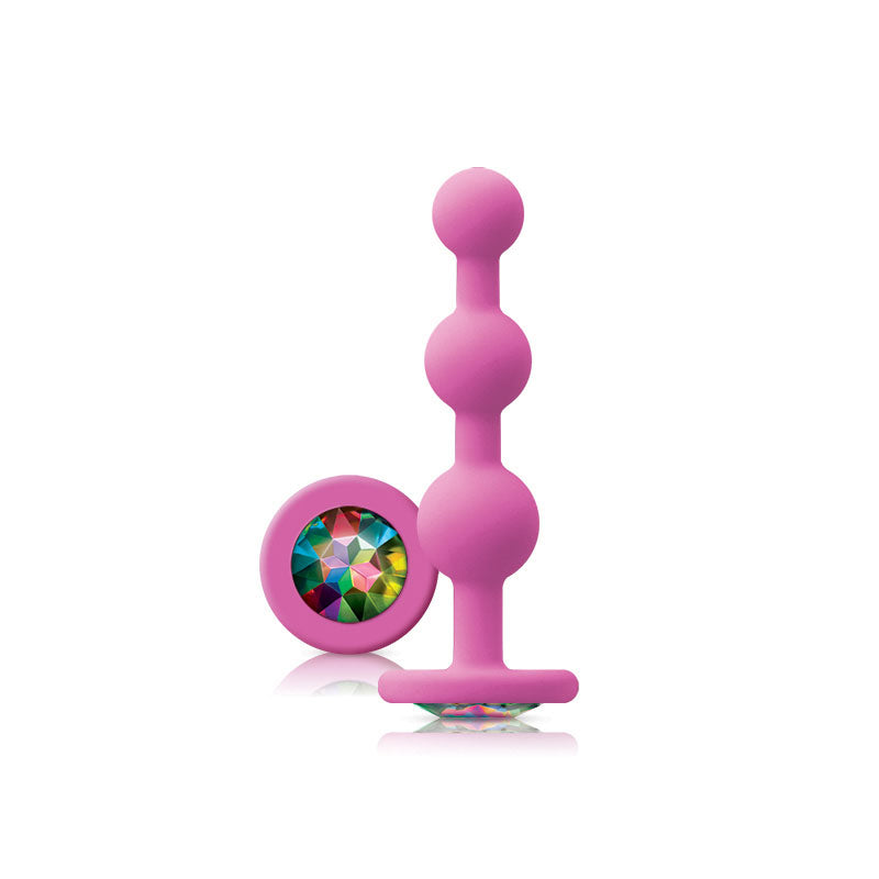 Glams pink ripple anal plug with rainbow gem, perfect for anal play.