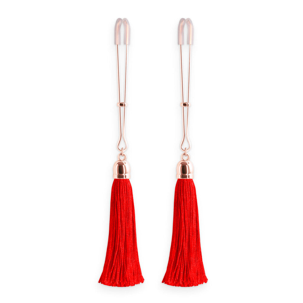 Red tassel nipple clamps from ns novelties: body jewellery for playful sensations.