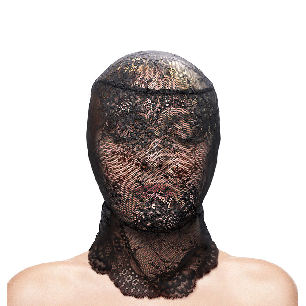 Close-up of a black lace hood, a striking fashion accessory with fetish undertones.