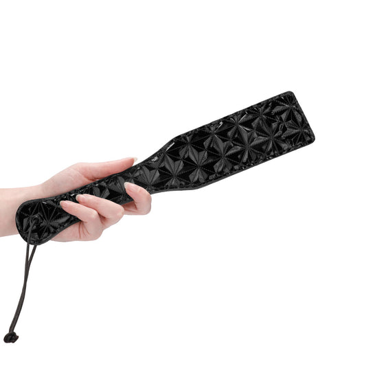 Shots Toys ouch black paddle with a comfortable handle, perfect for playful impact.